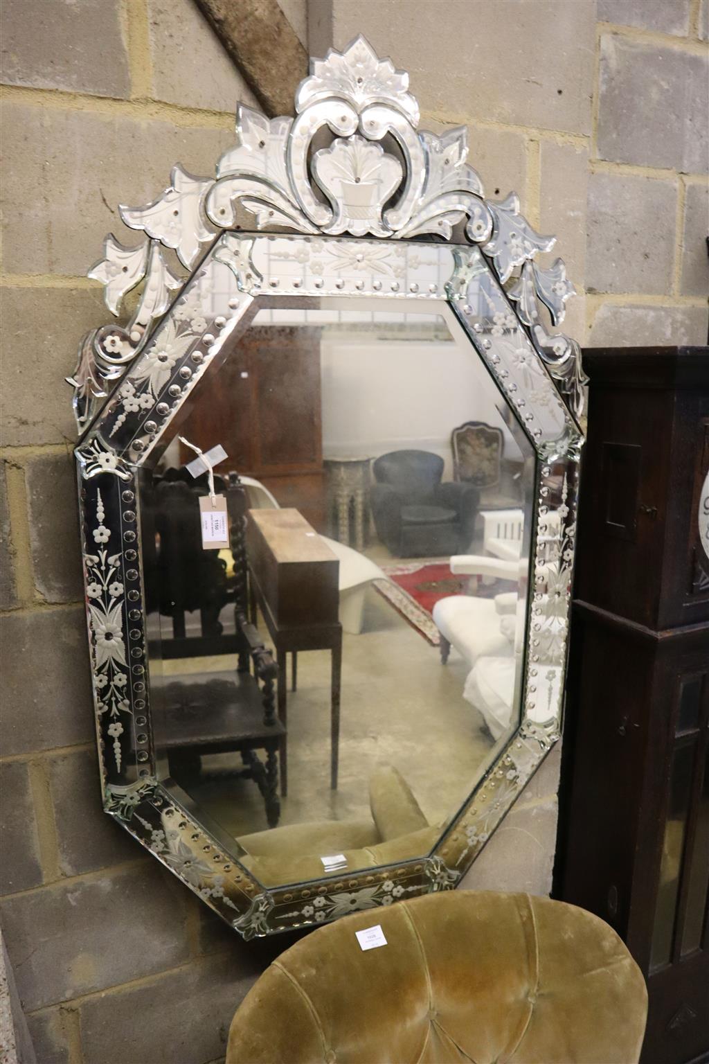 A Venetian engraved octagonal wall mirror, 74 x 130cm